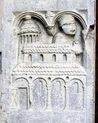 Anselme, fait moine, fonde l'abbaye de Nonantola (sculpture de Wiligelmo sur le portail de l'abbaye de Nonantola, 12ème siècle).
