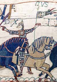 Eustache de Boulogne, représenté sur la tapisserie de Bayeux, et reconnaissable par ses moustaches. Son nom (EUSTATIVS), écrit au-dessus, et n'apparaît que partiellement à cause d'une déchirure de la tapisserie