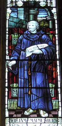 Guillaume de Malmesbury sur un vitrail de l'abbaye de Malmesbury.